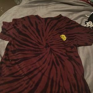 Red smiley face shirt